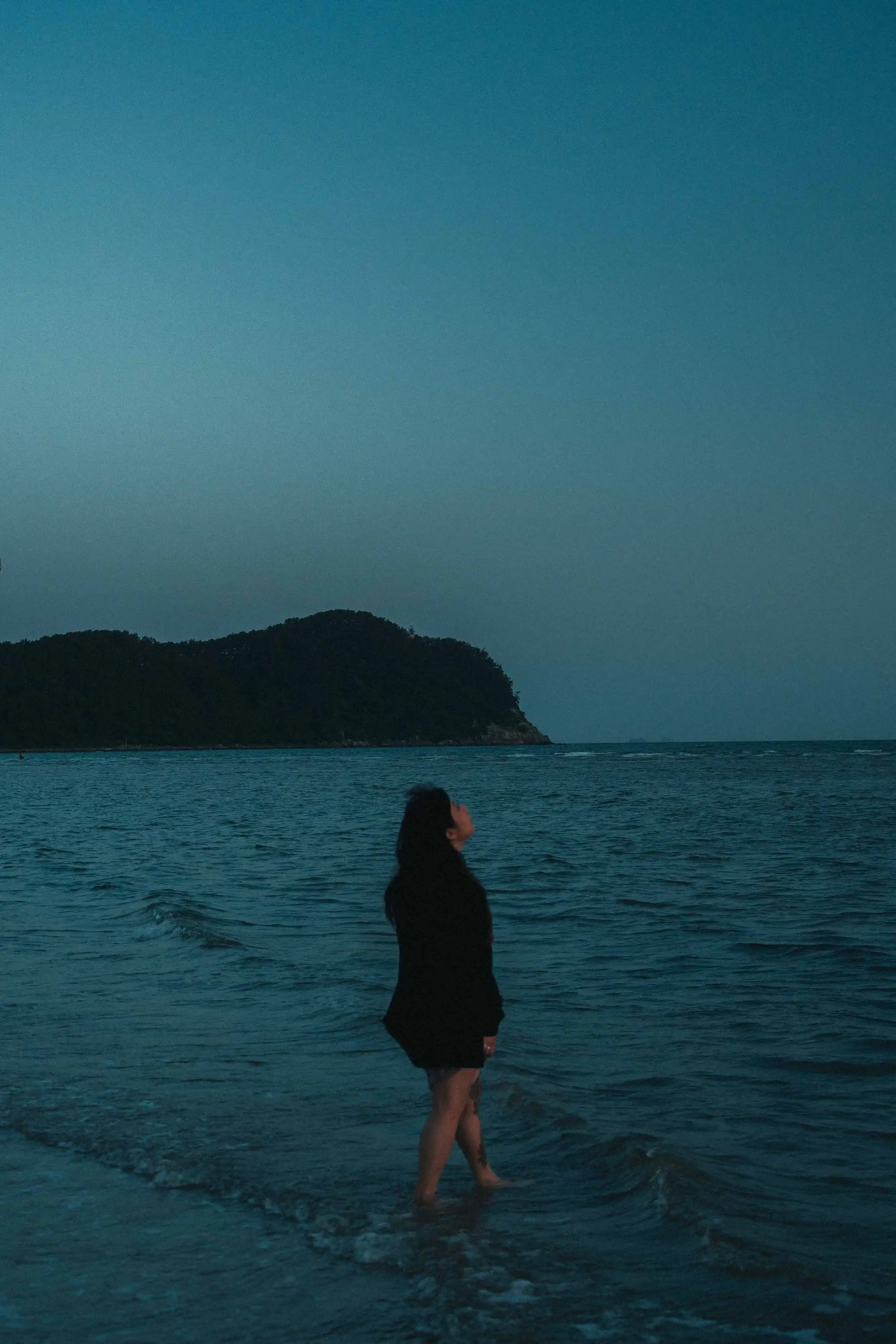 Girl walking on the beach in Korea