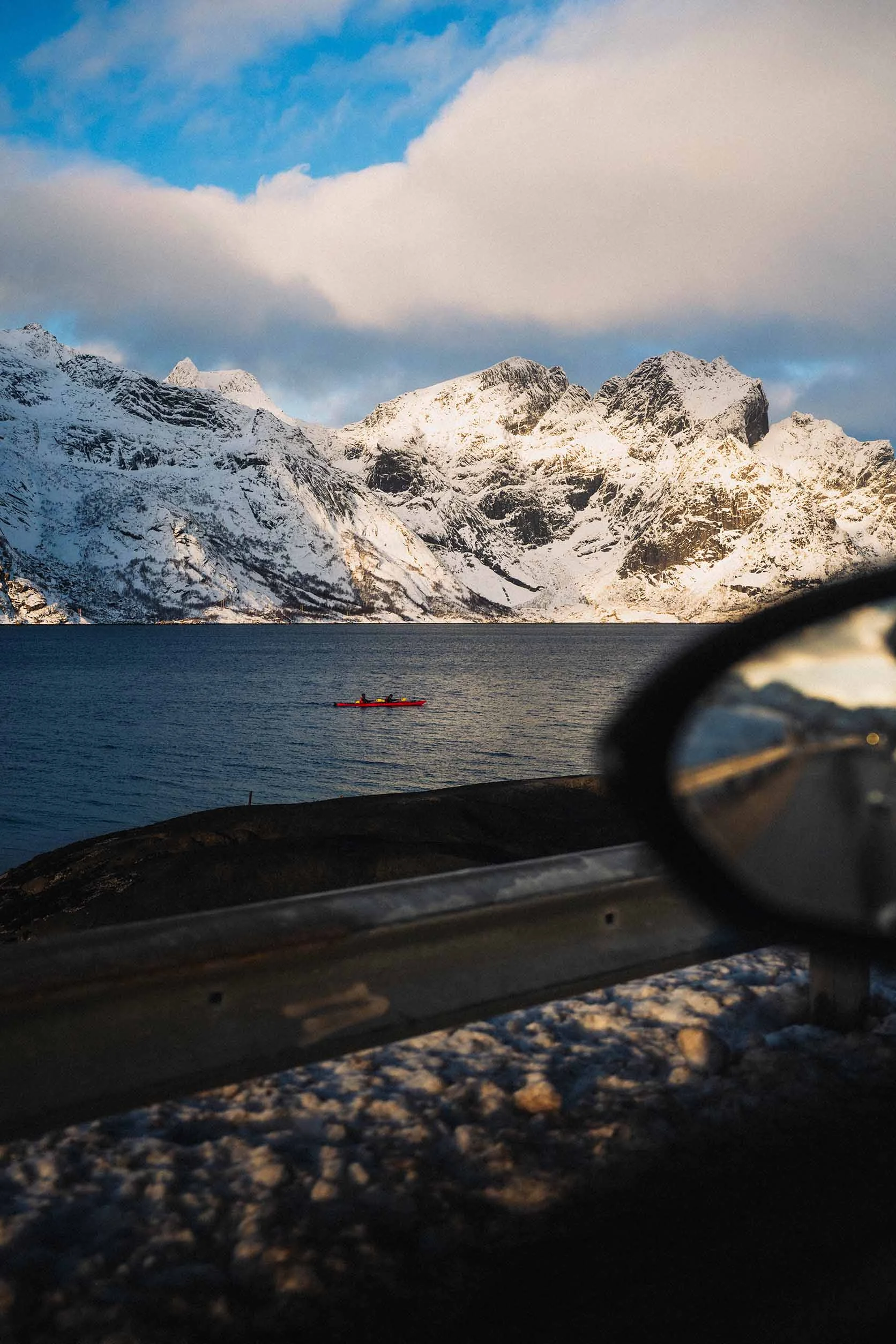 Kayak in the middle of a lake in the Lofoten